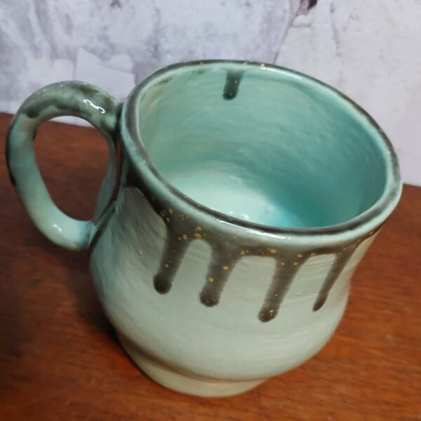 Bowed Teal . Mug